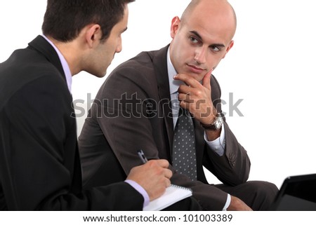 Businessmen interacting