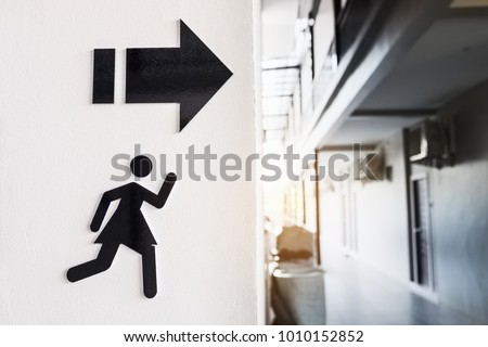 Sign of woman toilet on white cement wall background.