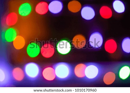 bokeh colored lights on black