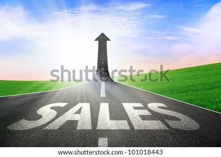 A road turning into an arrow rising upward symbolizing growth and improvement of sales