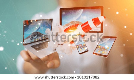 Businesswoman on blurred background connecting tech devices and startup rocket 3D rendering