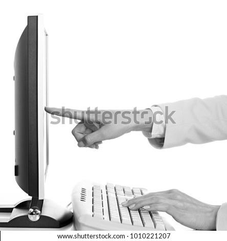hand pointing to computer screen in office on white background stock image and stock photo