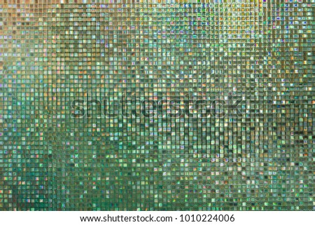 shiny prismatic grid background in green