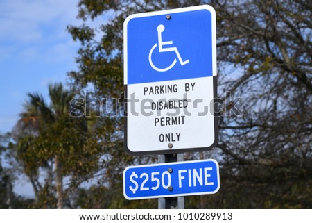 parking by disable permit only sign handicapped parking 250 dollar fine