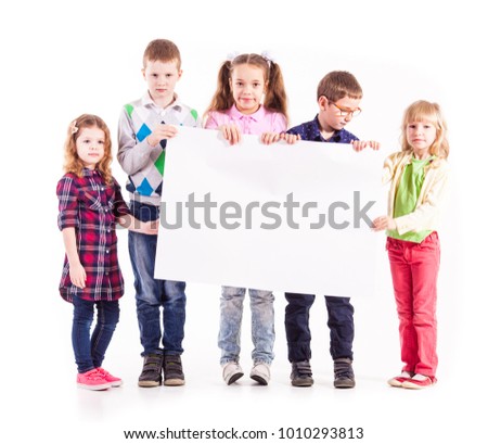 The kids are holding a white blank