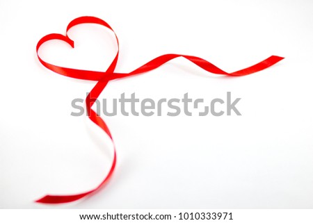 Ribbons shaped as hearts on white background, valentine day concept, happy valentine.