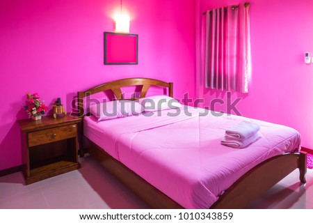 Pink love bedroom concept. Lovely bedroom on valentine day festival in hotel for tourist. It beautiful interior romantic and modern room. 