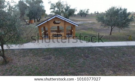 Pavilions with tables and benches in nature