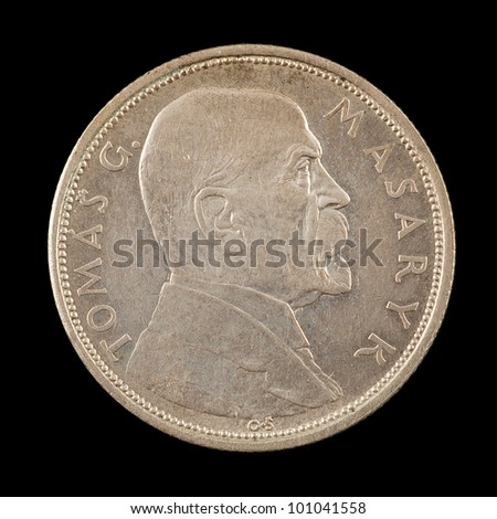 The old czechoslovakia coin on the black background