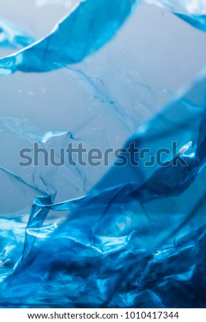 Plastic Shiny See Through Abstract Shimmer Creased Background Blue