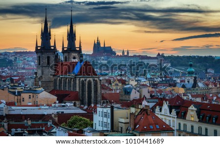 Aerial view over Church of Our Lady before Tyn, Old Town and Prague Castle at sunset in Prague, Czech Republic