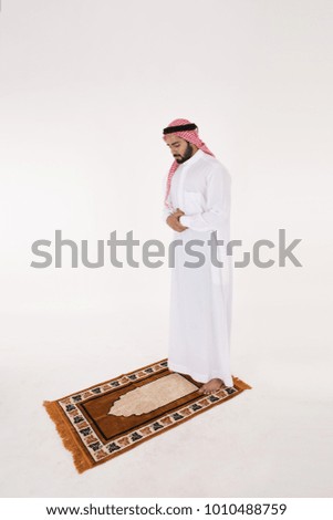 Muslim man praying on white Background