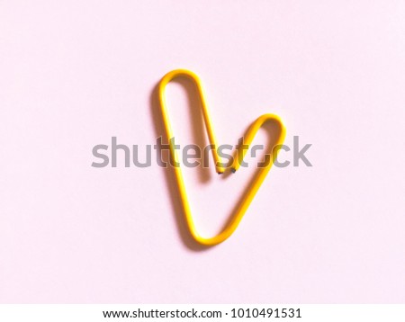 Nice yellow clip heart with pink background.