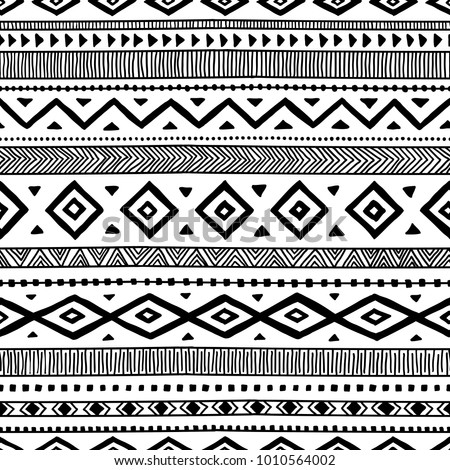 Seamless ethnic pattern. Handmade. Horizontal stripes. Black and white print for your textiles. Vector illustration. Royalty-Free Stock Photo #1010564002