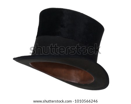 Black vintage top hat, isolated on white background.  Almost straight side view.
Tilted up a little, showing the interior leather band. Royalty-Free Stock Photo #1010566246