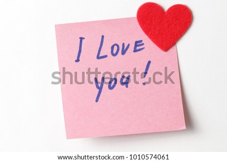 Text I love you on short note paper