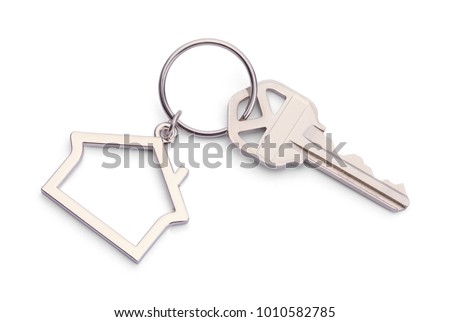 House Key With House Keychain Isolated on a White Background. Royalty-Free Stock Photo #1010582785