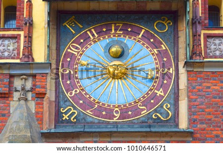 Sculptures ancient clock on the Market Square became a symbol of Wroclaw and one of the famous landmarks of the city in Poland, beloved by tourists and travelers

