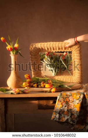 bunch of tulips flowers on thr wooden table