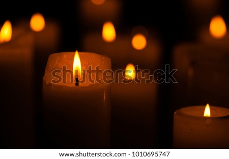 Some christmas candles in the dark. Vintage photo