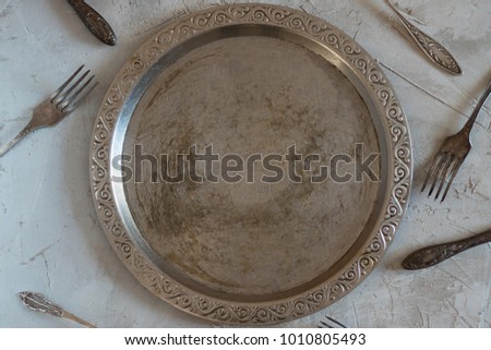 Empty Vintage metal round tray  Royalty-Free Stock Photo #1010805493