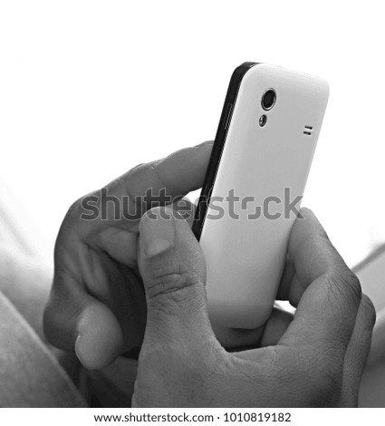 man with mobile phone in hand stock photo