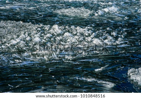 Pattern of summer ice and snow melt water pool on ice of the lake Baikal