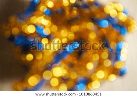 Bright fuzzy bokeh on the water surface or from the lights in the city or on holiday