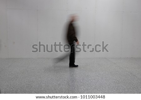 blurry person walking