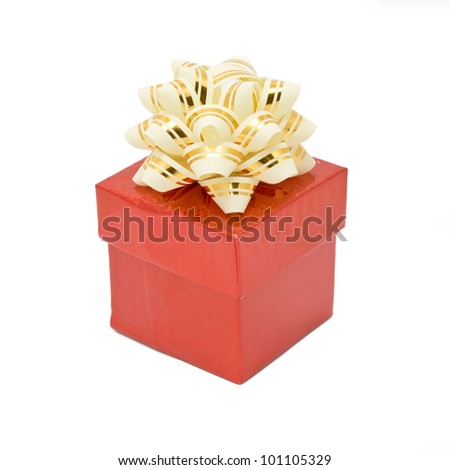 Single red gift box with silver-beige ribbon. Isolated on white background with clipping path