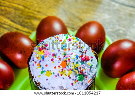 Easter cake and painted red Easter eggs. Food for the Easter table