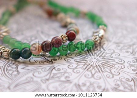 decoration female jewelry bracelet natural stone coral jade emerald Asia handmade gift celebration close-up picture of white background a symbol of summer fashion modern style accessory
