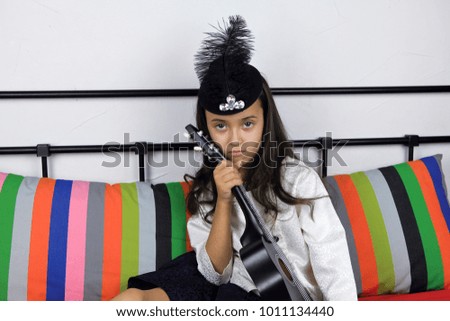 Photographing a child in a children's room