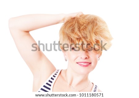 Cheerful funny woman with shaggy hair, isolated on white background
