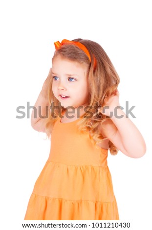 Cute little girl smiling, isolated on white background