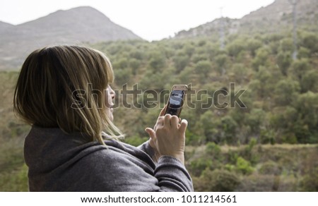 Woman with mobile talking on the phone, technology