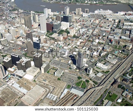 aerial cityscape, view of downtown New Orleans with the he Mississippi River cruise ship at the port the in the background; New Orleans Louisiana USA