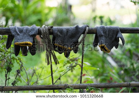 Backgrounds Textures Gloves on Wooden rail
