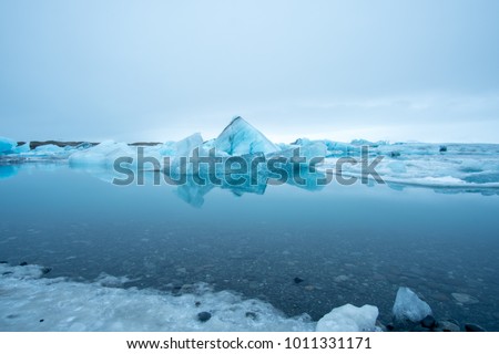 Floating icebergs in a water lagoon at Jokulsarlon Lagoon in South Iceland.