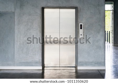 elevator with closed door Royalty-Free Stock Photo #1011350620