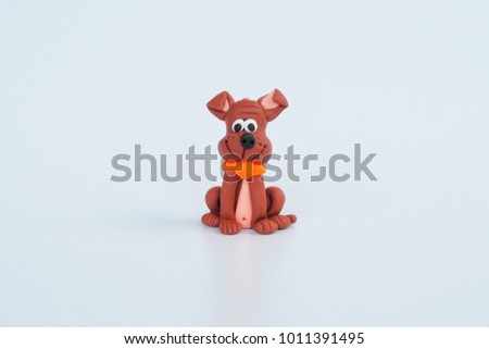 Cute cartoon clay friendly dog sit and smile to wait for owner on white background for kid decoration