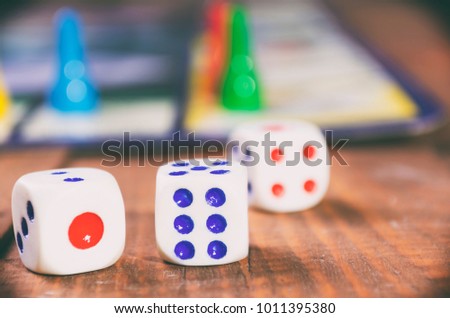 board game with dices on a wooden table