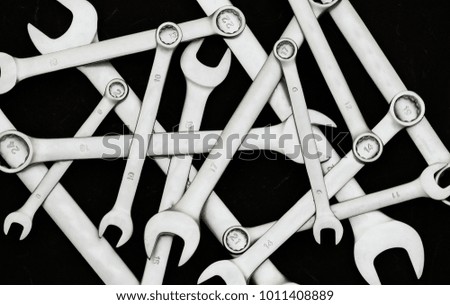Tools of mechanical in black background.