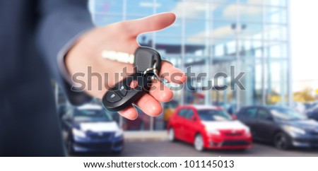 Hand with a Car keys. Transportation. Driving.