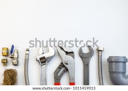 plumbing tools and equipment top view Royalty-Free Stock Photo #1011459013