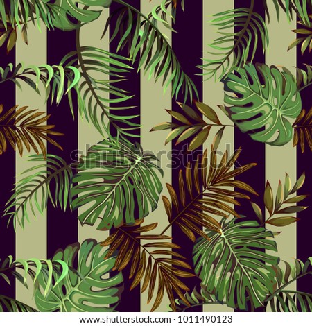 Seamless pattern with leaves of tropical and exotic plants on a striped background