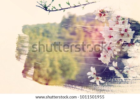 dreamy and abstract image of cherry tree. double exposure effect with watercolor brush stroke texture
