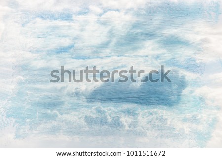 dreamy and abstract image of the blue sky with white clouds. double exposure effect with watercolor brush stroke texture
