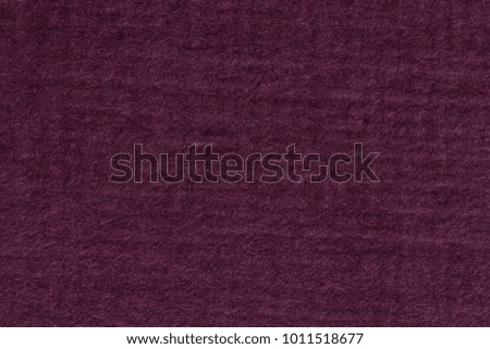 Purple paper with vignette, a background or texture. High resolution photo.