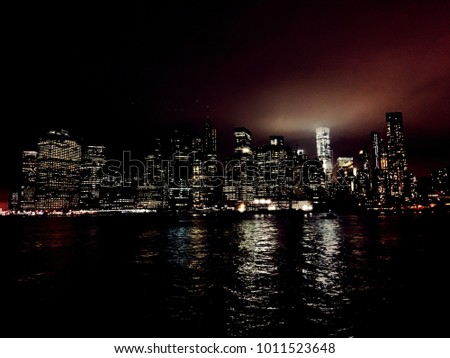 Night panorama of Manhattan from the Brooklyn Bridge. NY